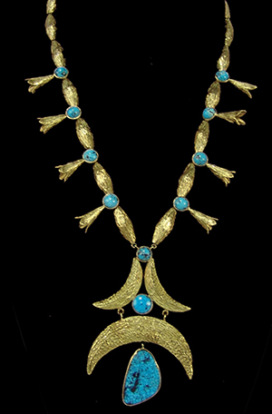 Early 1970s 14K gold necklace with custom beads, squash blossoms and spiderweb turquoise stone. Price realized: $5,750. Allard Auctions Inc. image